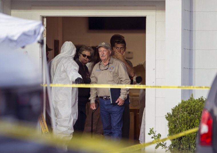 Image: Investigators work at the scene of a mass shooting at the First Baptist Church in Sutherland Springs