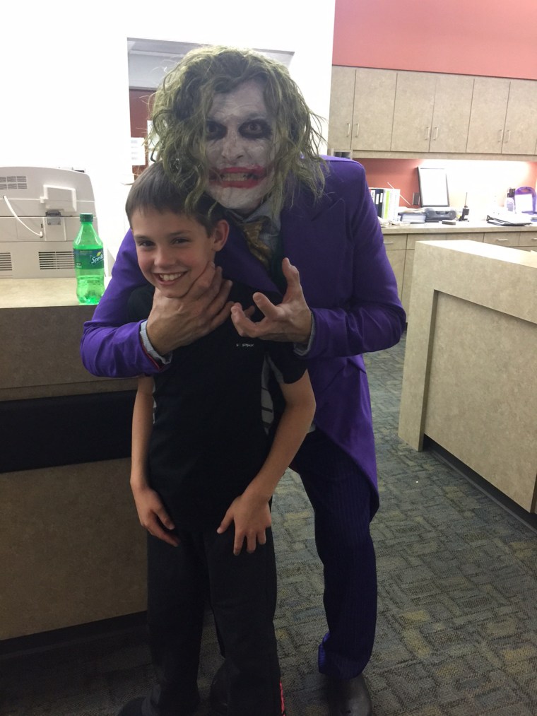 Young Brenden was delighted that his new baby sister was delivered by The Joker!J