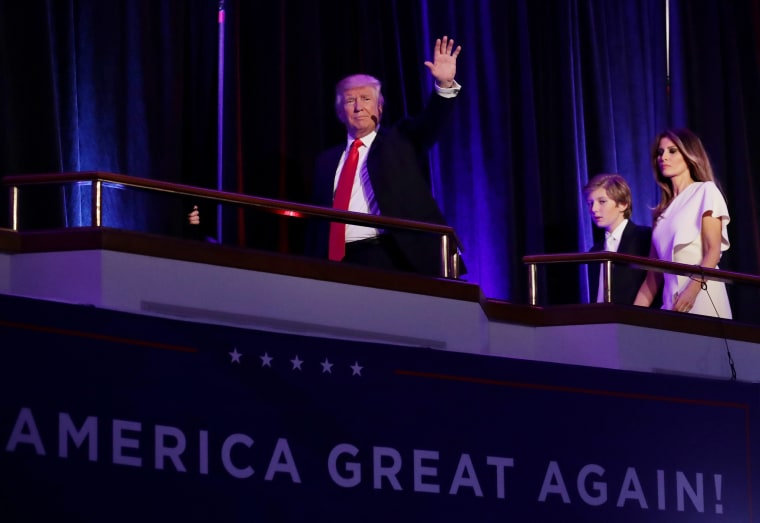 Image: Trump acknowledges the crowd along during his election night event