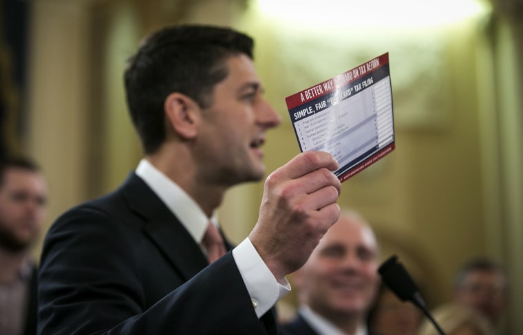 Image: Speaker of the House Paul Ryan (R-Wis.), joined by other Republican legislators, holds up an example of what a \"postcard\" tax return might look like during a news conference to unveil a tax reform plan, on Capitol Hill in Washington.