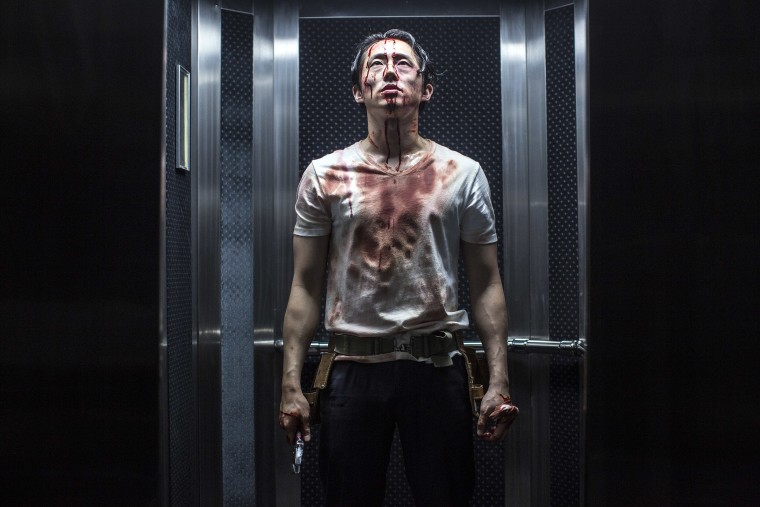 Steven Yeun as Derek Cho in the horror, action film "Mayhem," an RLJE Films release.