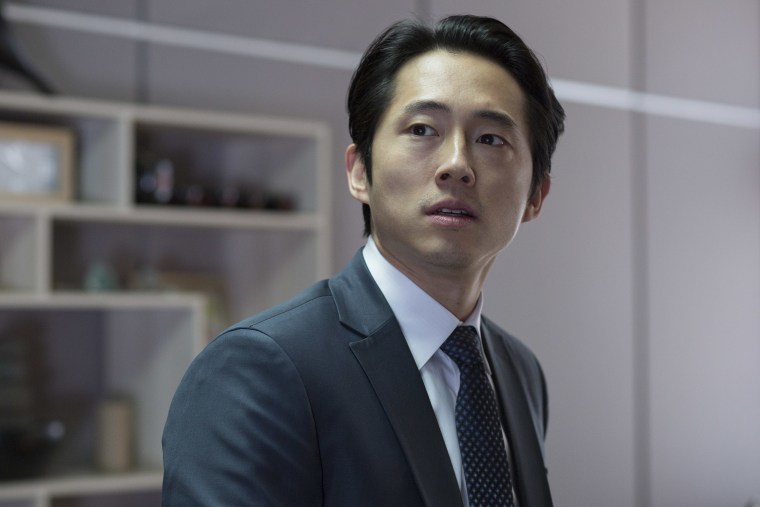 Steven Yeun as Derek Cho in the horror, action film "Mayhem," an RLJE Films release.