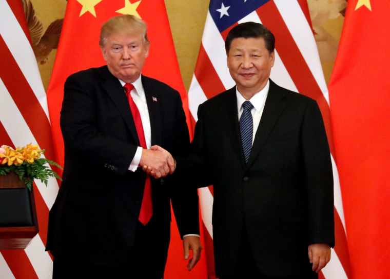 Image: U.S. President Donald Trump and China's President Xi Jinping make joint statements at the Great Hall of the People in Beijing