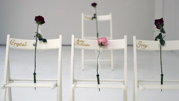 A memorial for the victims of the shooting at Sutherland Springs First Baptist Church includes 26 white chairs, each painted with a cross and and rose, is displayed in the church Sunday, Nov. 12, 2017, in Sutherland Springs, Texas.