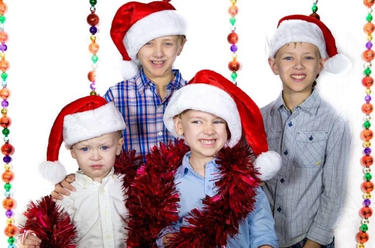 Dana Kamp says her mom took her four sons to a photo shoot to help her get a photo for her Christmas cards. The result still has them laughing.
