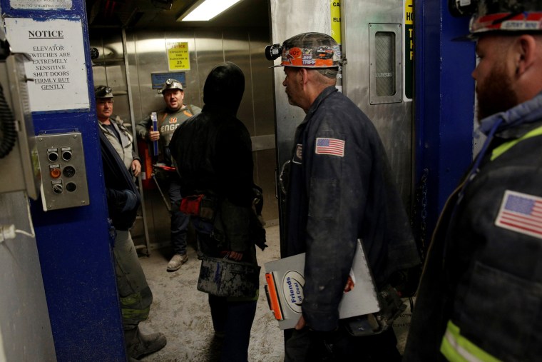 Image: Miners enter an elevator before descending the American Energy Corporation Century Mine at in Beallsville, Ohio