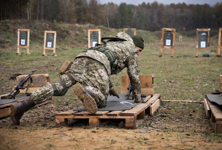 Image: A Ukrainian soldier gets ready to train with Canadian Forces