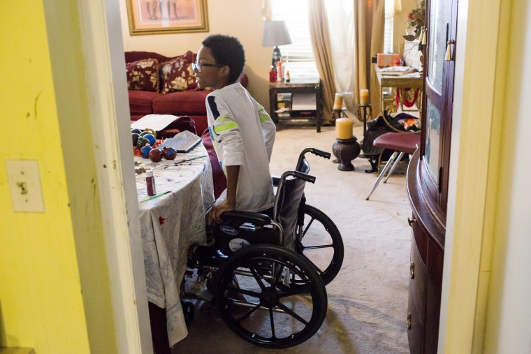 Image: Roland Williams, 11, makes Christmas ornaments