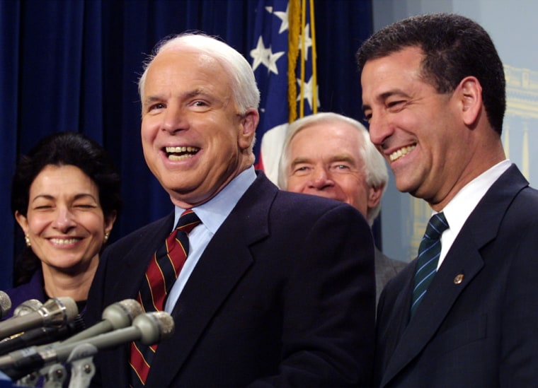 Image: senators celebrate the passage of the McCain-Feingold campaign finance bill