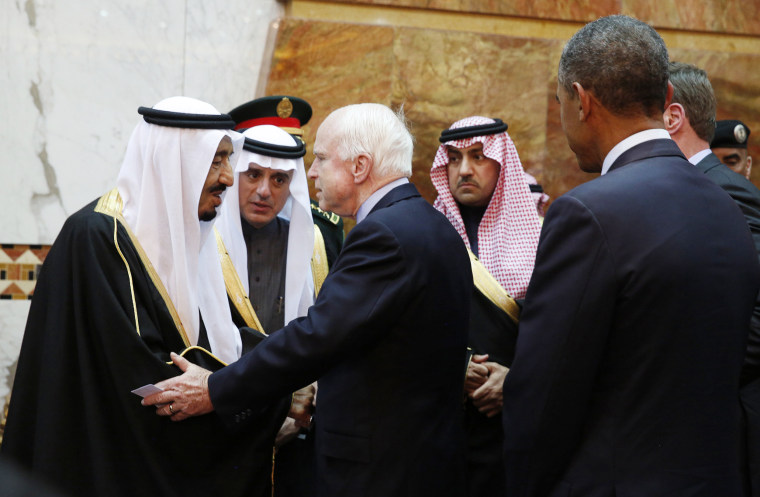 Image: Saudi Arabia's King Salman greets U.S. Senator McCain as U.S. President Barack Obama looks on at Erga Palace in Riyadh