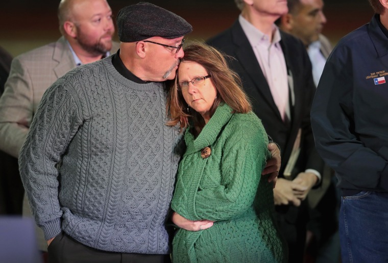 Image: Pastor Frank Pomeroy comforts his wife Sherri during a memorial service for the victims of the First Baptist Church of Sutherland Springs shooting
