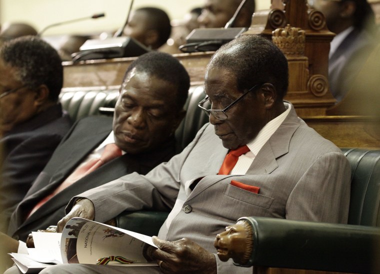 Image: Emmerson Mnangagwa and Robert Mugabe