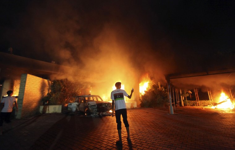 Image: The U.S. Consulate in Benghazi is seen in flames in September 2012