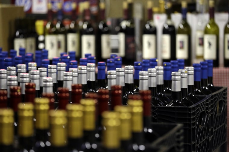 In this photo taken Tuesday, Jan. 10, 2017, growlers of wine set to be shipped to retail outlets are on display at Wilridge Winery, in Seattle.