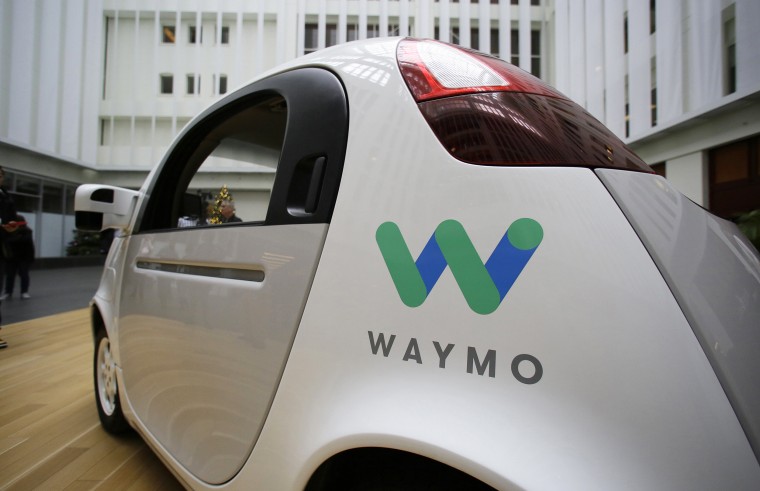 Image: The Waymo driverless car is displayed during a Google event