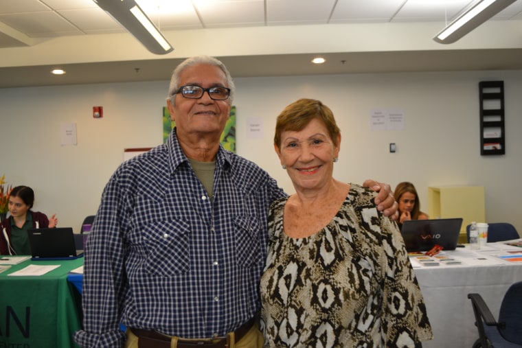 Luis Acosta (Left) and Amelia Villanueva (Right) recently arrived from Puerto Rico. They are planning to stay in Miami for a few months. They sought assistance from the hurricane relief center in Miami International Airport on November 29, 2017.