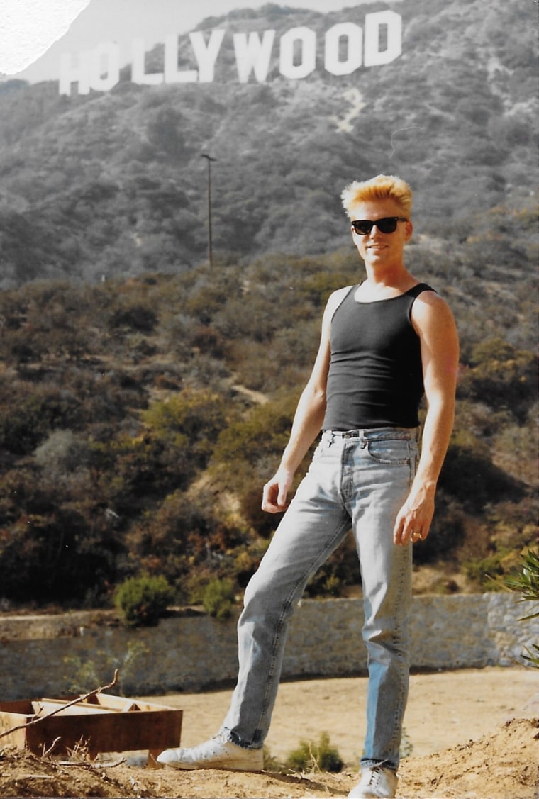 Mark S. King stands in front of the Hollywood sign shortly after moving to California in 1982. 