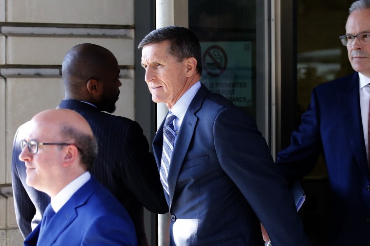 Image: Former U.S. National Security Adviser Michael Flynn departs after plea hearing at U.S. District Court in Washington