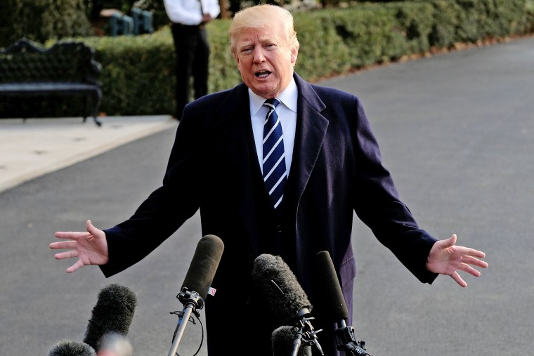 Image: U.S. President Donald Trump speaks to reporters before departing the White House for New York in Washington