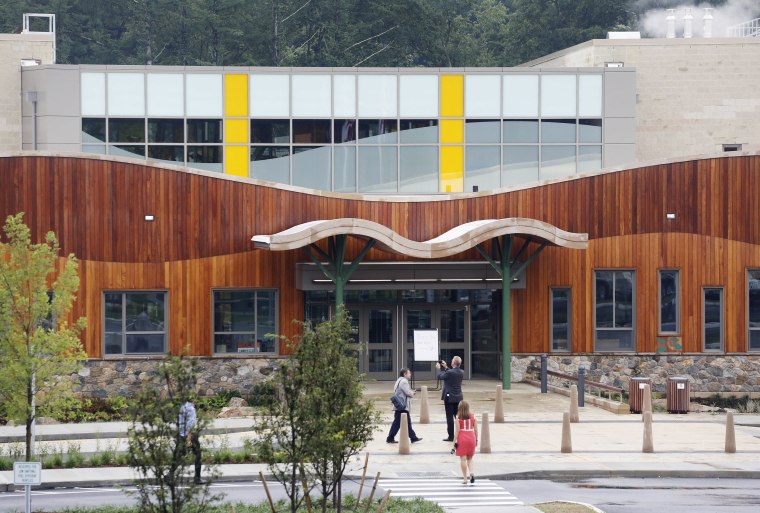 People attend an open house at the new Sandy Hook Elementary School in Newtown, Connecticut, on July 29, 2016.