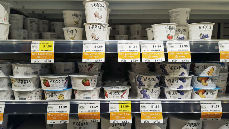 Image: Siggi's yogurts are seen with lower, Amazon prices on the shelves of Whole Foods.