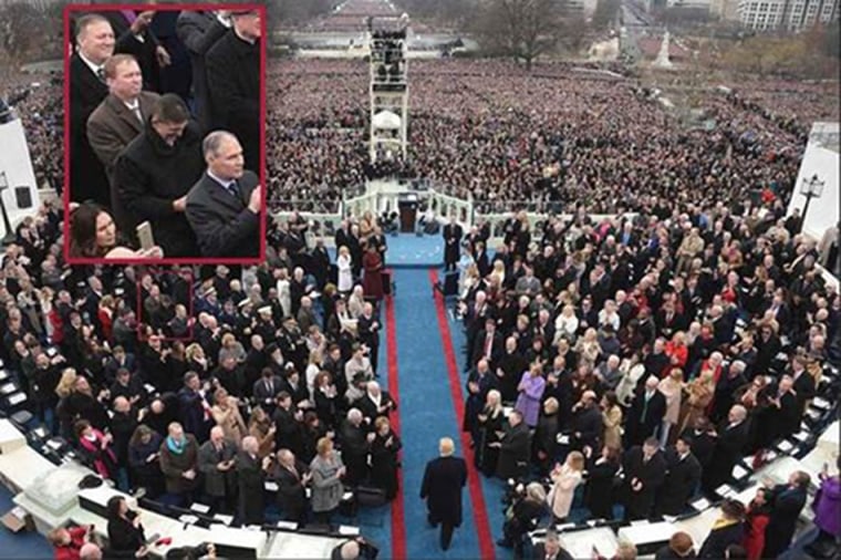 Image: Michael Flynn appears to look at his phone during President Trump's inauguration ceremony.