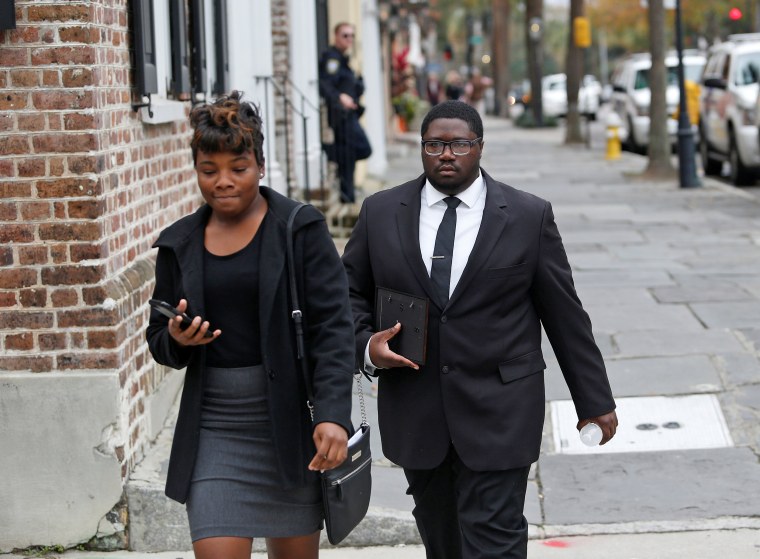 Image: Walter Scott's son Miles Scott leaves the Charleston federal court building after testifying during the 3rd day of the sentencing hearing for former North Charleston policeman Michael Slager in Charleston