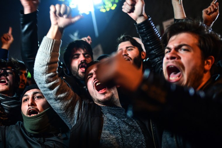 Image: Protesters chant against America outside the U.S. Consulate in Istanbul Wednesday night.