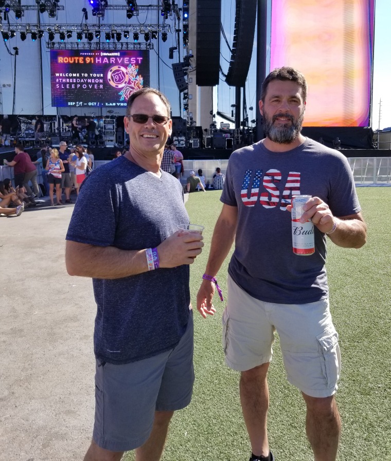 Mike Cronk, right, and Rob McIntosh at the Harvest 91 Festival in Las Vegas in October, where a gunman killed 58 people. McIntosh was among the more than 500 people injured. 