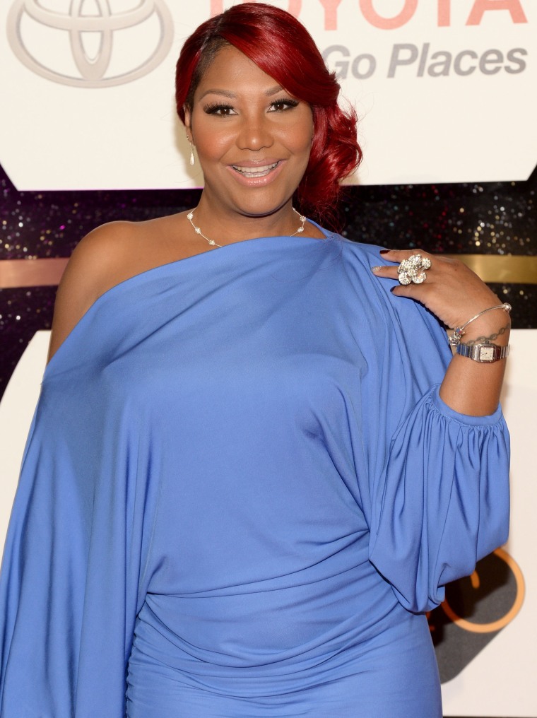 Traci Braxton mulled wine hair color