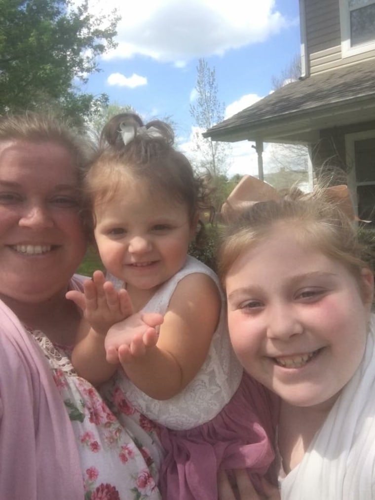 Tana Benson, pictured in 2017 with her daughters, Teegan and Taylor.