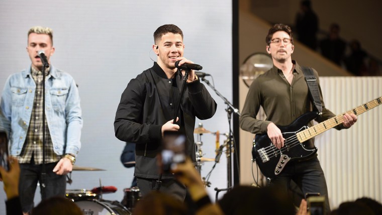 Nick Jonas celebrates the holidays at the Chase Pay Village