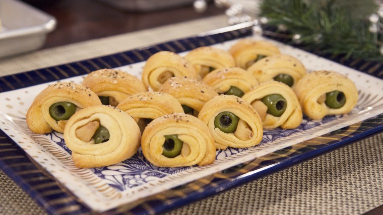 Damaris Phillips, author of the cookbook "Southern Girl Meets Vegetarian Boy," joins Megyn Kelly TODAY to demonstrate delicious and easy holiday appetizers, including baked brie, olives in a blanket, and spinach and feta tarts.