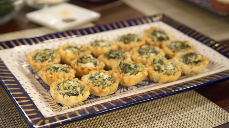 Damaris Phillips, author of the cookbook "Southern Girl Meets Vegetarian Boy," joins Megyn Kelly TODAY to demonstrate delicious and easy holiday appetizers, including baked brie, olives in a blanket, and spinach and feta tarts.