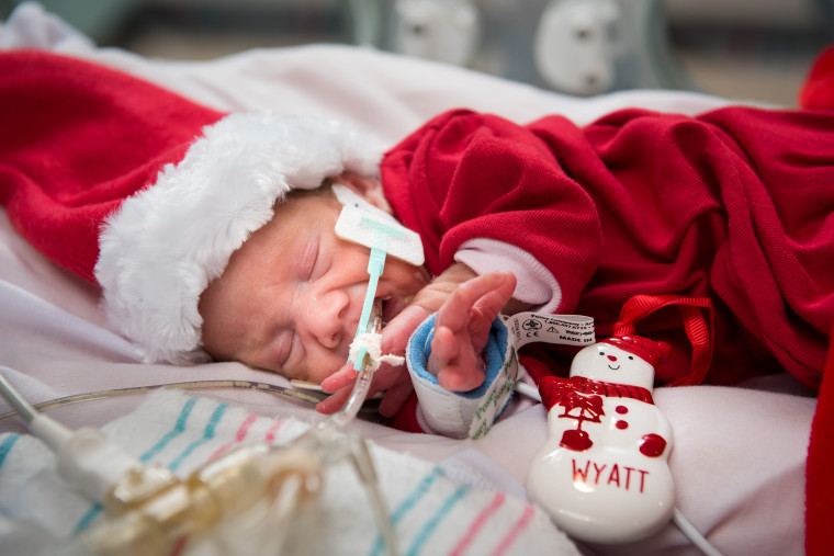 Wyatt was 13 weeks early but he has steadily been gaining weight and improving his strength. When Santa visited it was the first time Wyatt was healthy enough to wear clothes.