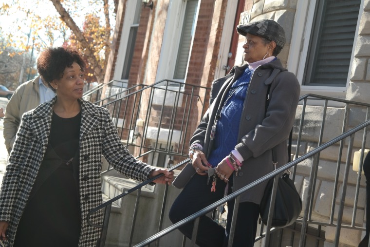 Dr. Joy Knight Lanier with a resident of Martha's Place, a facility that works with women overcoming drug addiction and homelessness.