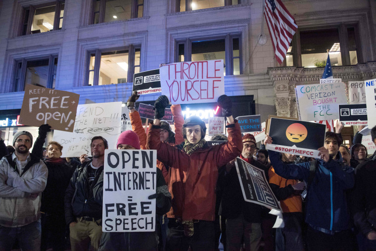 Image: Protesters gather on Bolyston Street in front of a Verizon store during a Net neutrality rally on Dec. 7, 2017 in Boston, Massachusetts.