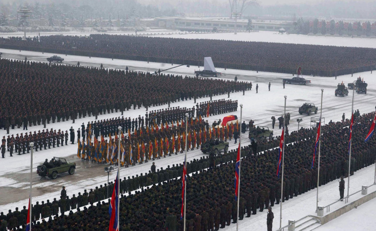 Image: The casket of former North Korean leader Kim Jong Il is carried through Pyongyang in December 2011.