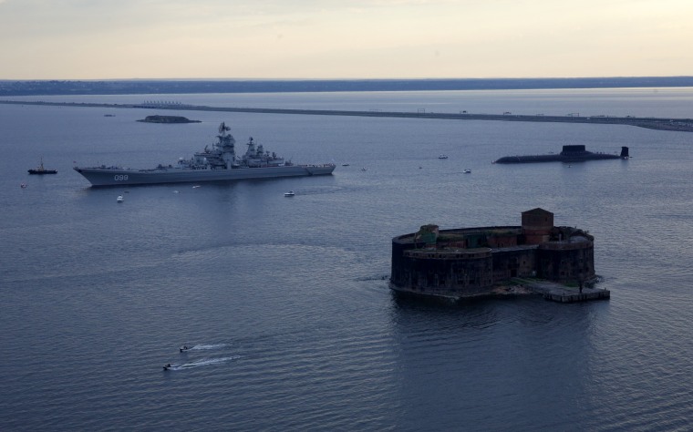 Image: Russian nuclear missile cruiser Pyotr Veliky (Peter the Great) and nuclear submarine Dmitry Donskoy moored on the eve of the the Navy Day parade in Kronshtadt, a seaport town in the suburb of St. Petersburg, Russia, July 28, 2017.