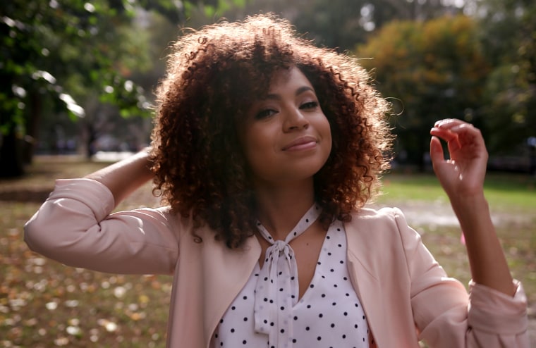 Edgy, a social media influencer, loves her curly hair now. 