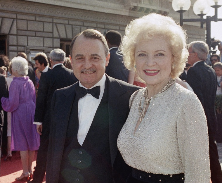 Image: John Hillerman, left, and Betty White, right, arriving at Emmy Awards in Pasadena, California on Sept. 22, 1985.