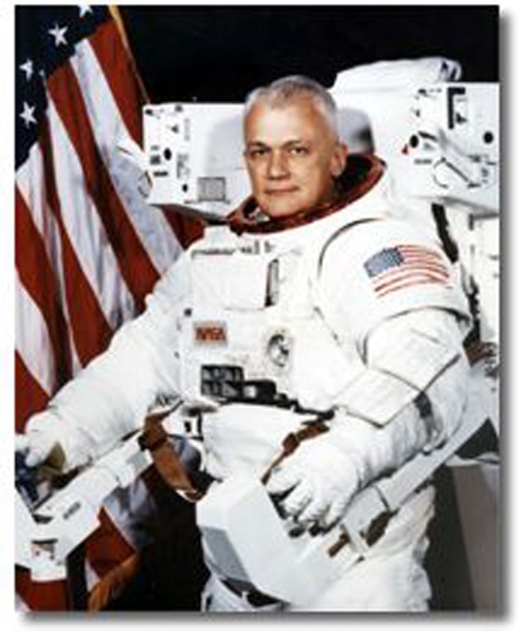 Image: This 1982 photo made available by NASA shows astronaut Bruce McCandless II, wearing a Shuttle Extravehicular Activity (EVA) Suit with Manned Maneuvering Unit (MMU) in Houston.