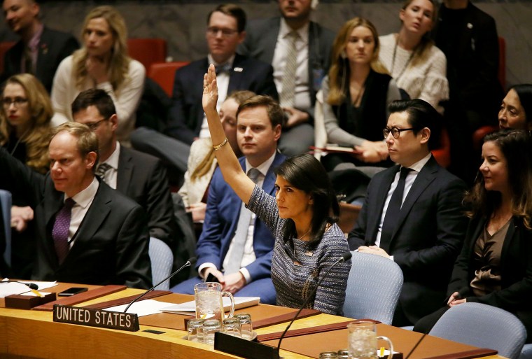 Image: Nikki  Haley, the United States Ambassador to the U.N., votes with other members of the U.N. Security Council to impose new sanctions on North Korea on Dec. 22, 2017 in New York City.