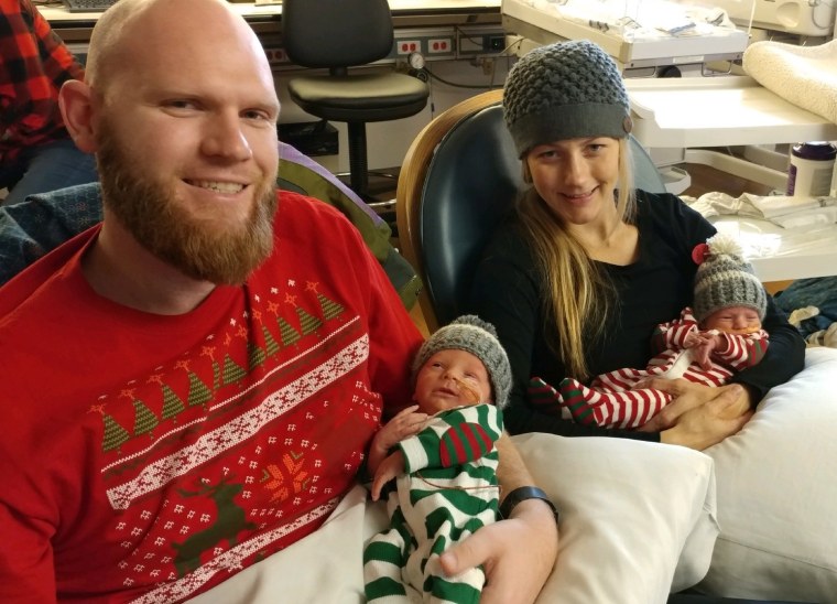 Katie Moss with her husband, Daniel, and her twin sons, Luke and Soren. The couple also has a 4-year-old son named Gabriel.