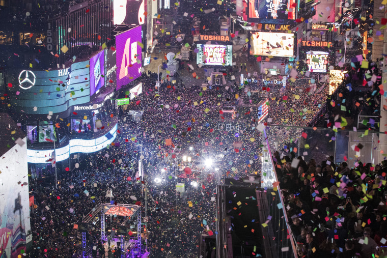 Revelers celebrate the new year as confetti flies over New York's Times Square as seen from the Marriott Marquis, Sunday, Jan. 1, 2017.