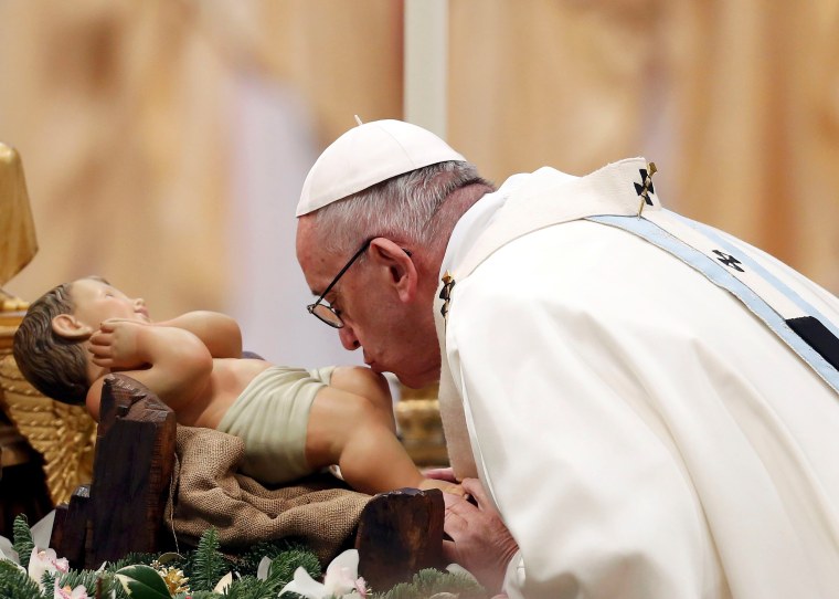 Image: Pope Francis leads a mass on New Year's Day at Saint Peter's Basilica at the Vatican