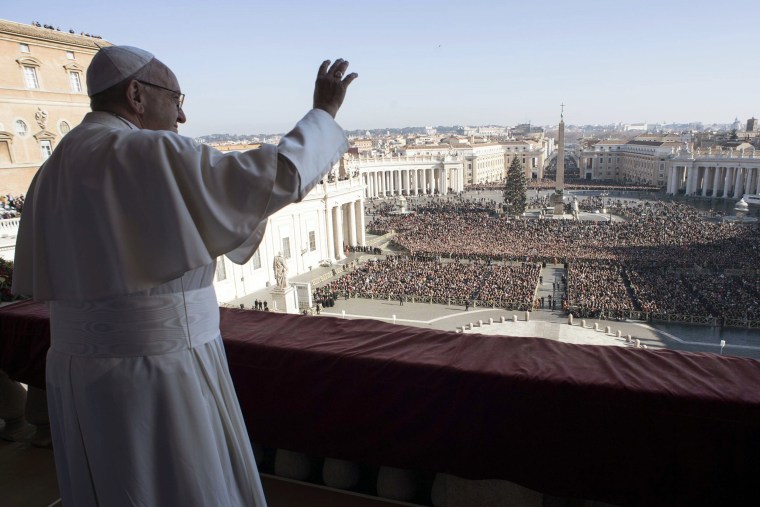 Image: Pope Francis waves to faithful during the Urbi et Orbi