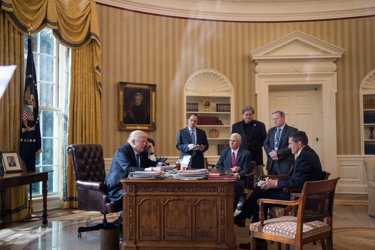 Trump speaks on the phone with Russian President Vladimir Putin in the Oval Office on Jan. 28, 2017.