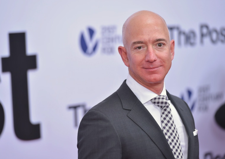 Image: Jeff Bezos arrives for the premiere of \"The Post\"