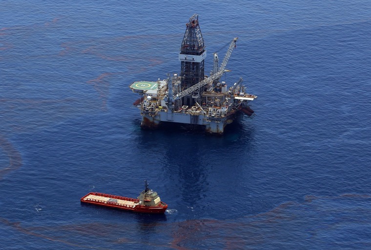 Image: Crews on ships work on stopping the flow of oil at the source site of the Deepwater Horizon disaster on May 29, 2010 in the Gulf of Mexico near Venice, Louisiana.